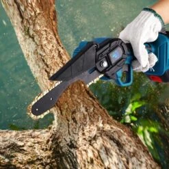 Scie à Chaîne électroportative 1200W ONEVAN - Mini Tronçonneuse électrique - Sans Fil 6 Pouces Pour Makita 18V - Vitesse Réglable Pour La Coupe Du Bois - Bleu Avec 2 Batteries, 4 Chaînes Or Et 2 Guide 11 Scie à Chaîne électroportative 1200W ONEVAN - Mini Tronçonneuse électrique - Sans Fil 6 Pouces Pour Makita 18V - Vitesse Réglable Pour La Coupe Du Bois - Bleu Avec 2 Batteries, 4 Chaînes Or Et 2 Guide -TronçOnneuse Et Accessoire Sales 54715088 5